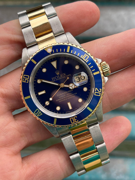 Pre-owned Rolex Submariner Date “Bluesy” 16613 – 40mm Two-Tone Blue Dial